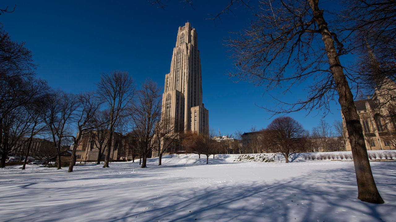 4K Desktop Wallpaper of the Cathedral of Learning with snow